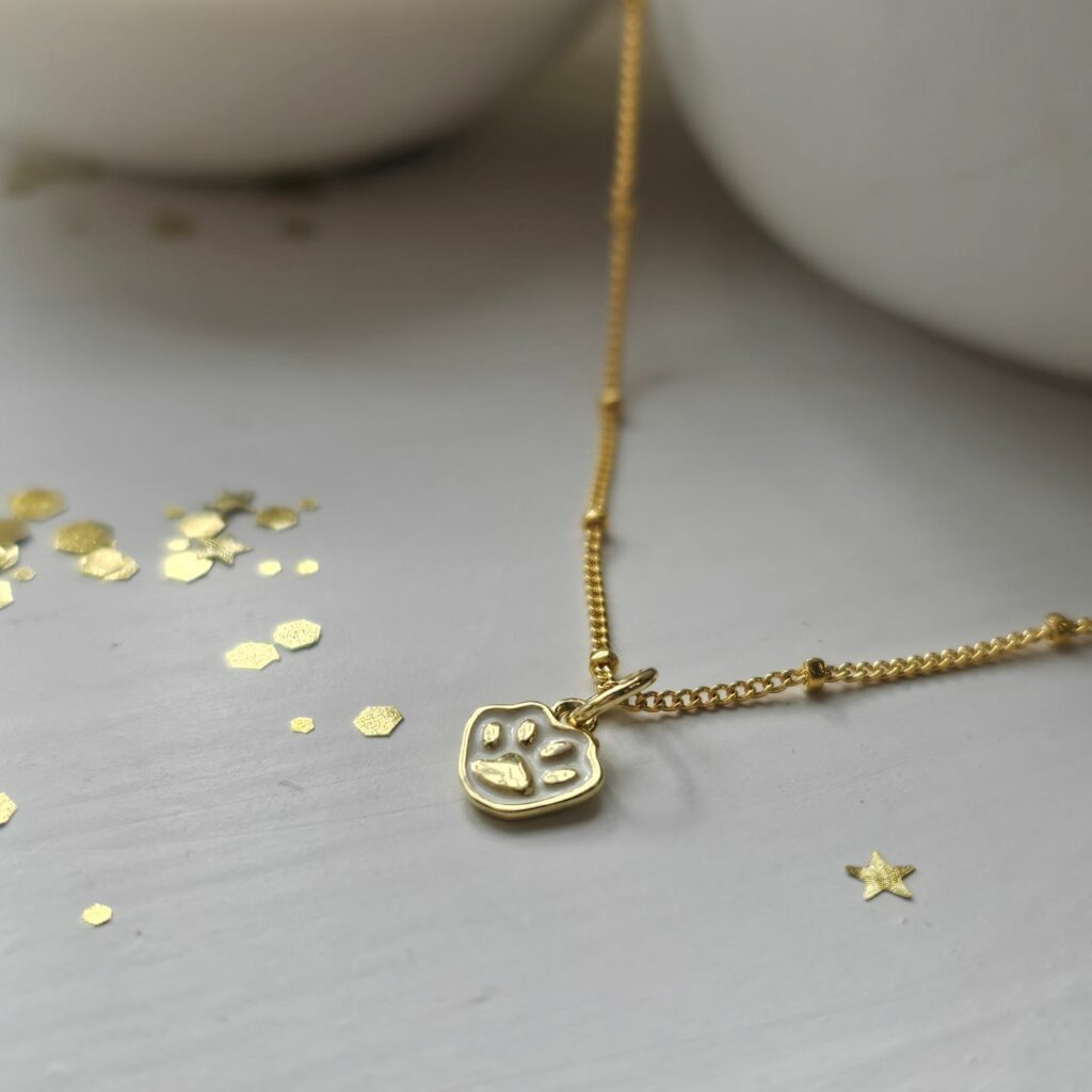 Tiny Golden Paw Paw Necklace