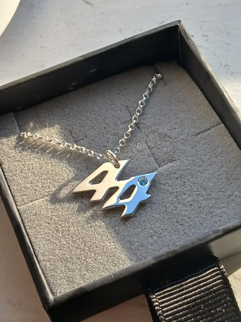 Miniature 44 Necklace in Sterling Silver with Blue Topaz Stone