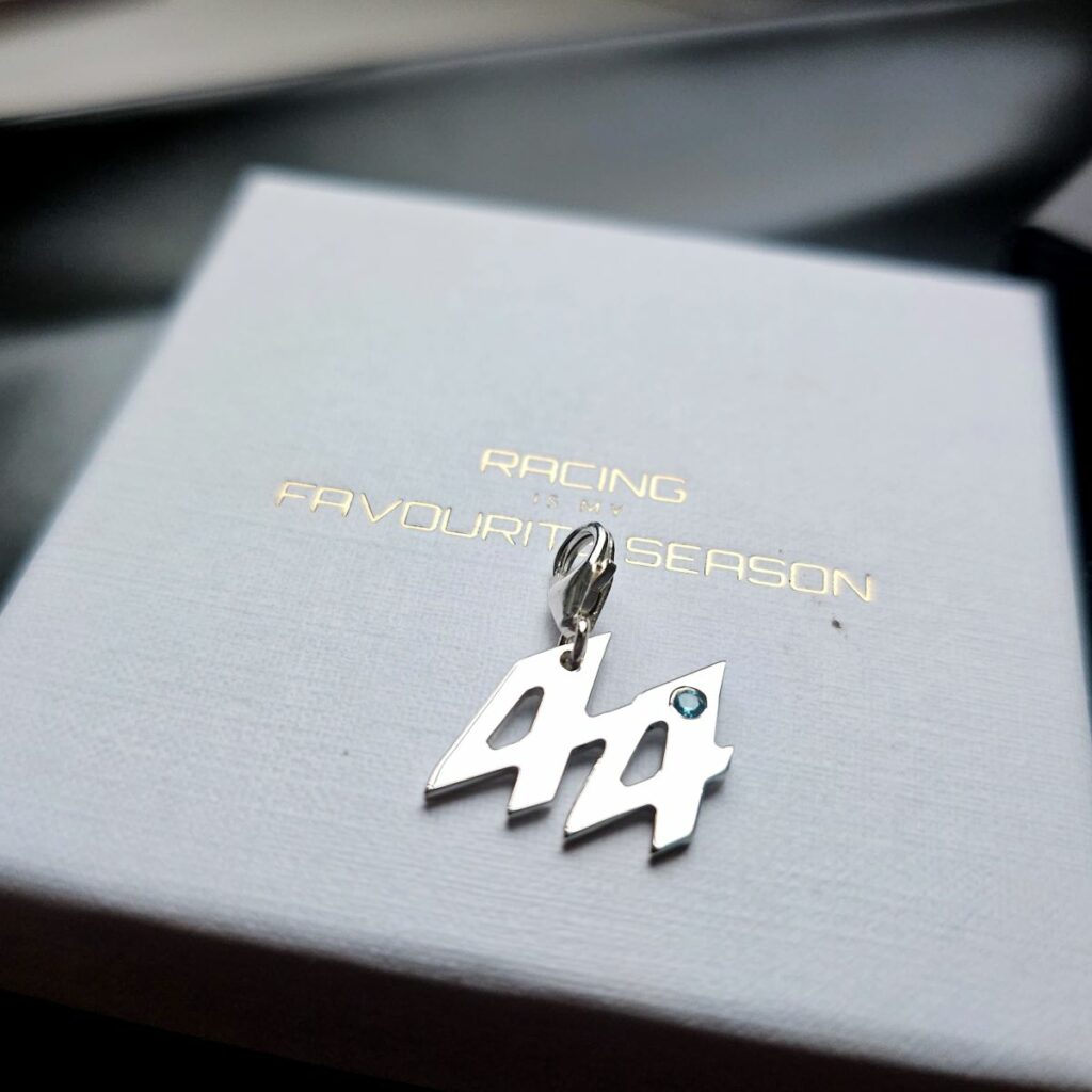Miniature 44 Charm in Sterling Silver with Blue Topaz Stone