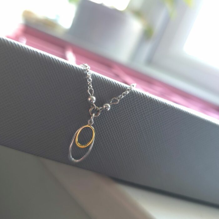 Hidden Gem Oval Golden and Silver Necklace - Image 2