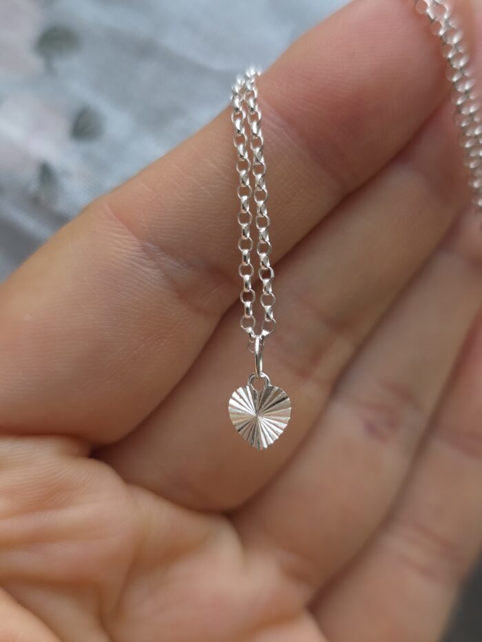 Tiny Starburst Heart Necklace in Sterling Silver