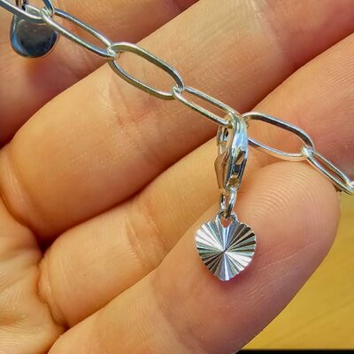Tiny Starburst Heart Charm in Sterling Silver