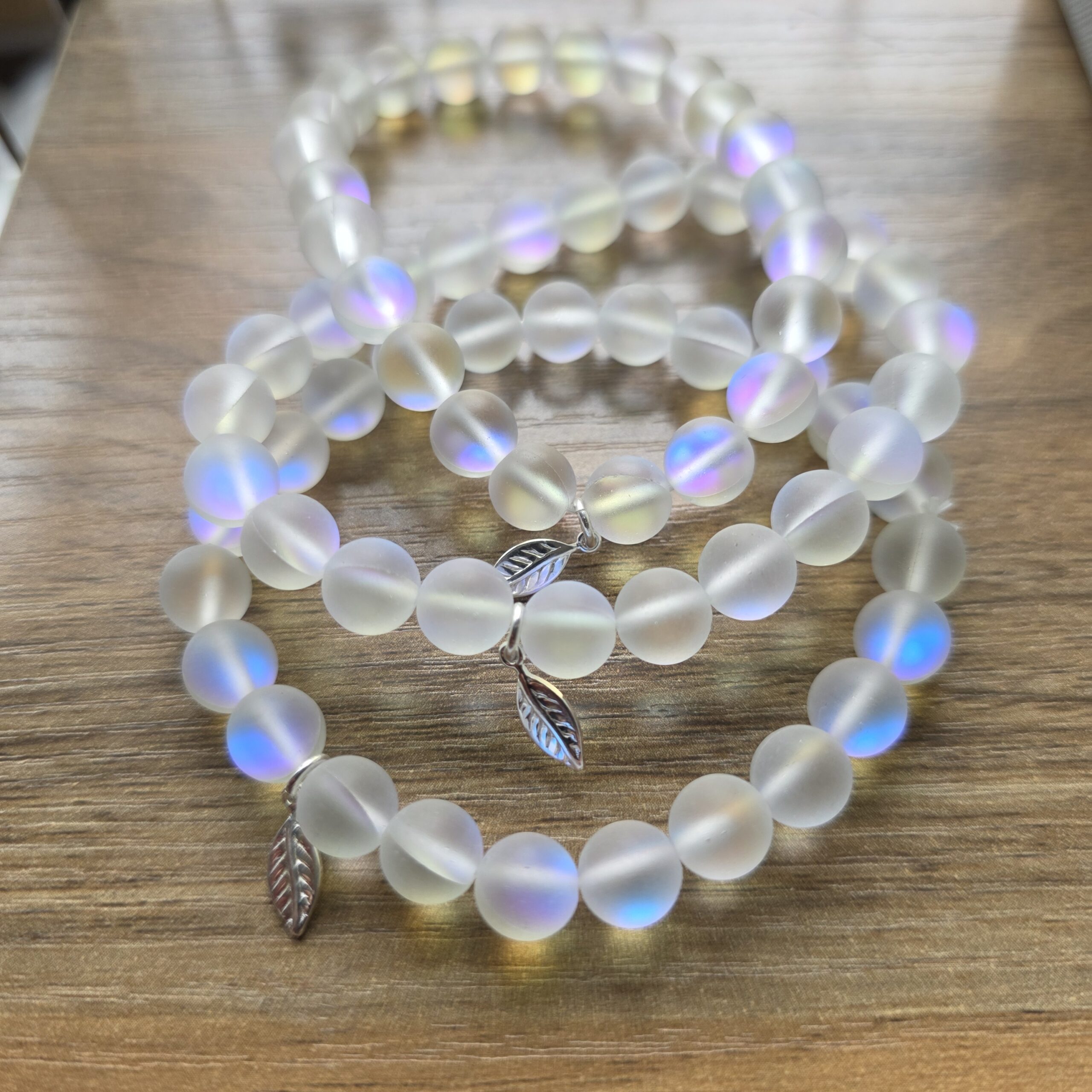 Iridescent Rainbow Aura Quartz Stretchy Bracelet with Tiny Sterling Silver Feather - Image 5