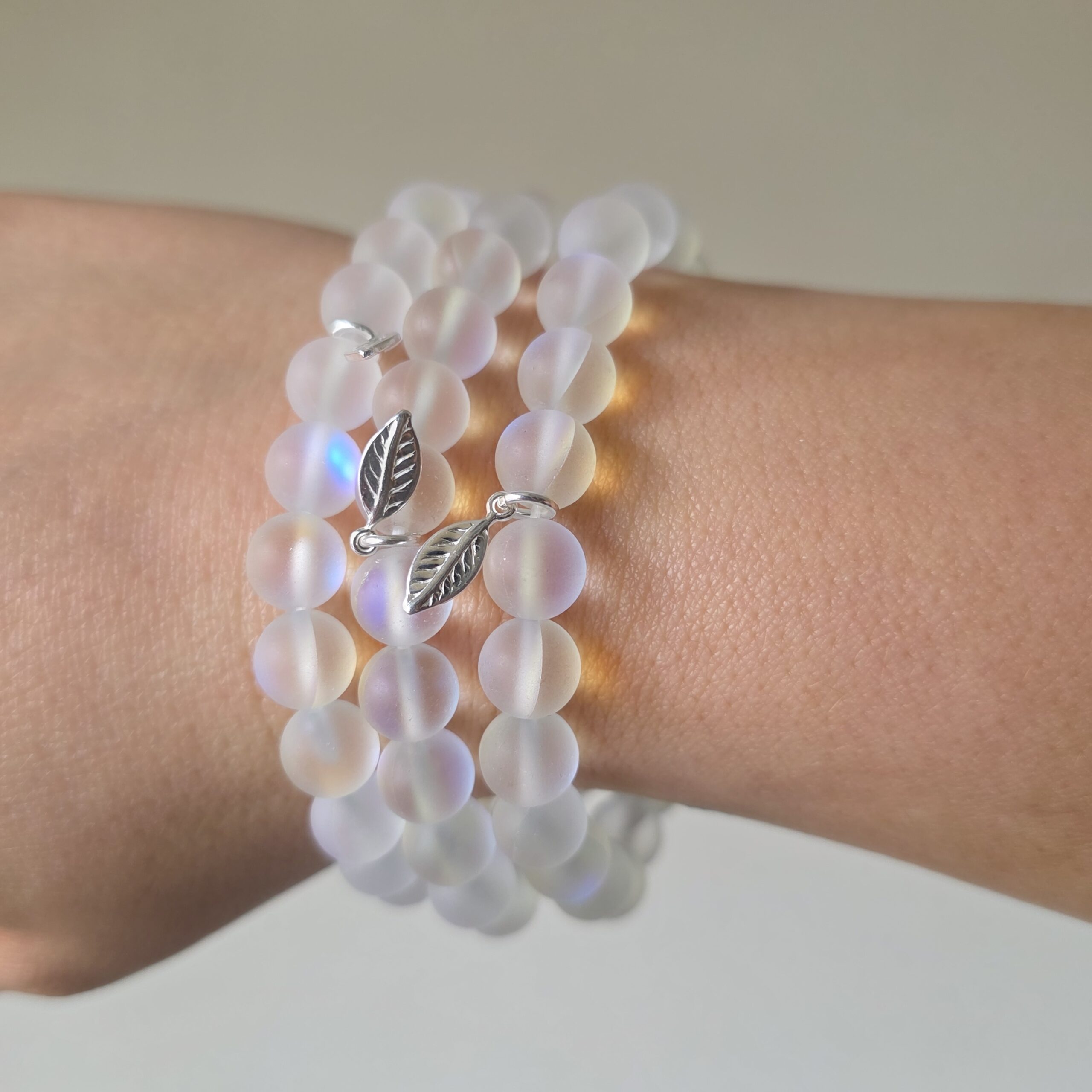 Iridescent Rainbow Aura Quartz Stretchy Bracelet with Tiny Sterling Silver Feather - Image 2