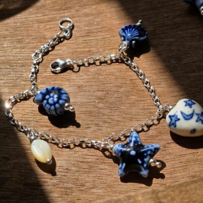 She Sells Sea Shells Ceramic Charm Bracelet in Sterling Silver