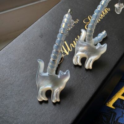 The Witches Companion Mother of Pearl Cat Hoops in Sterling Silver